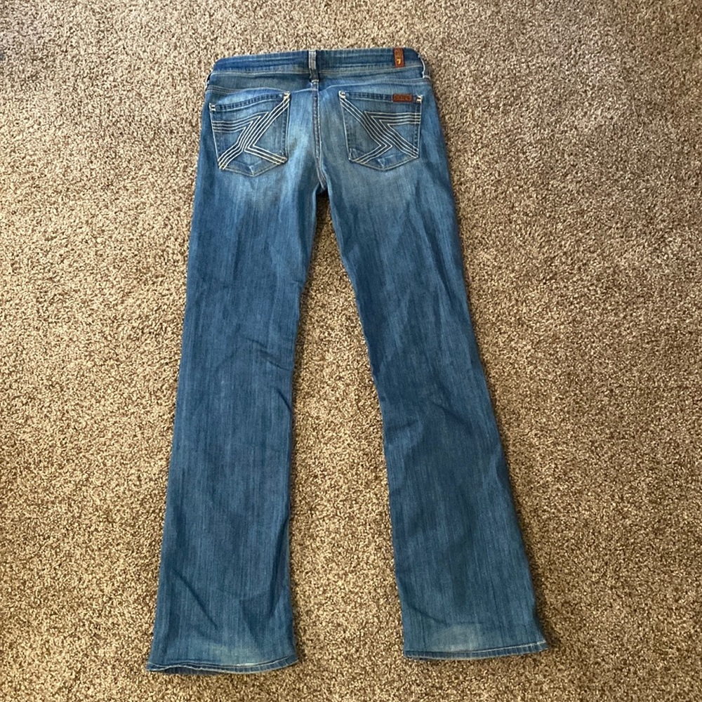 7 for All Mankind, bootcut jeans. Size 25. Good condition. Have been hemmed